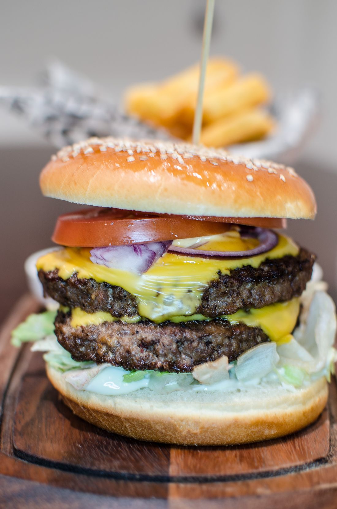 Melting cheese on cheeseburger
