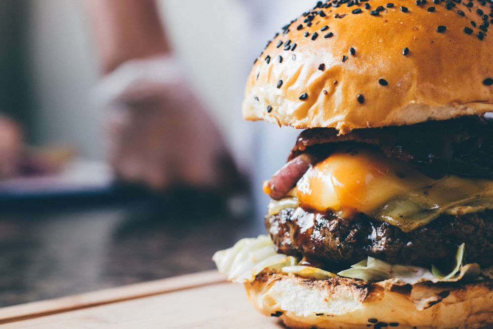Cheeseburger with sesame bun and beef patty