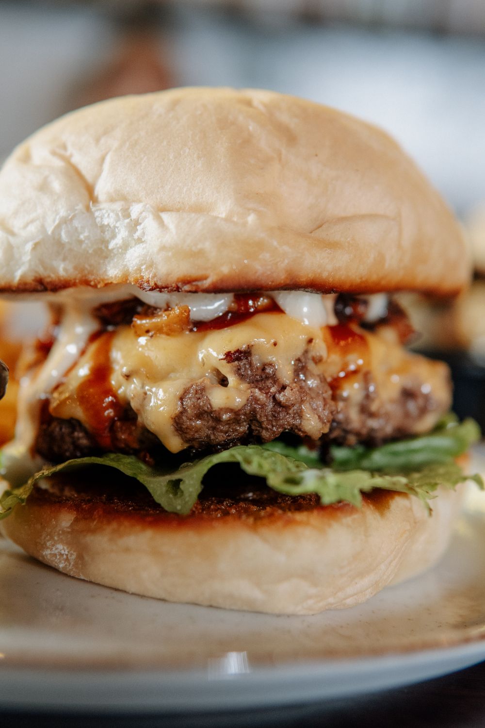 Cheeseburger with lettuce cheese and ketchup