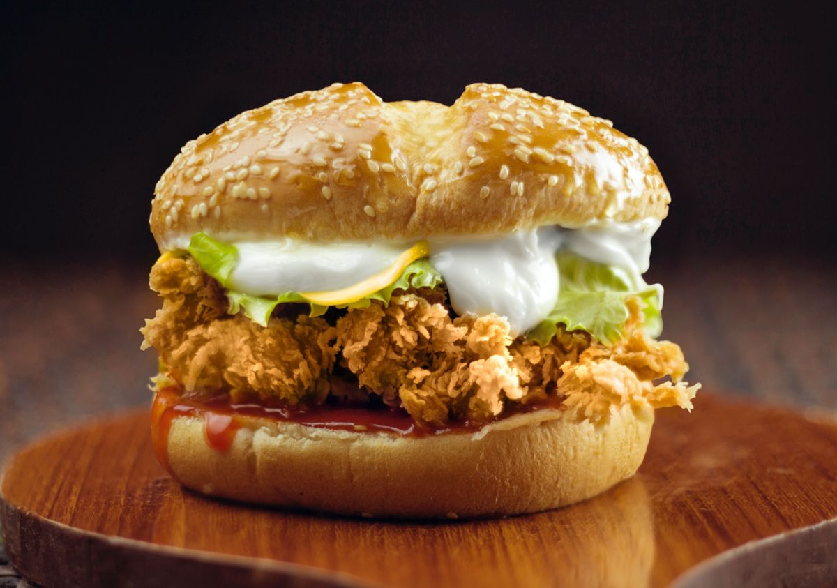 Chicken Burger with sesame bun and beef patty
