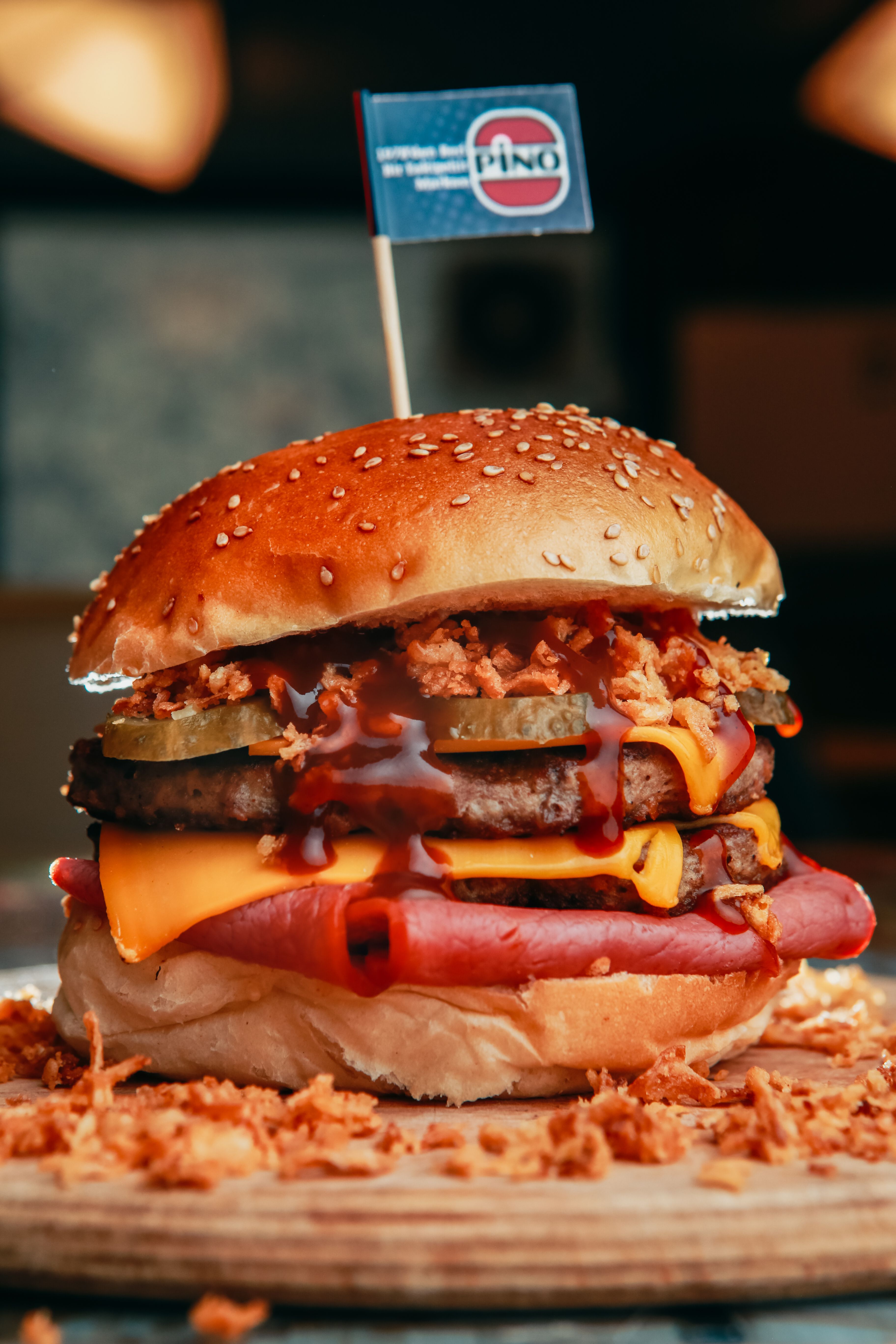 Loaded burger with bacon cheese and stacked toppings