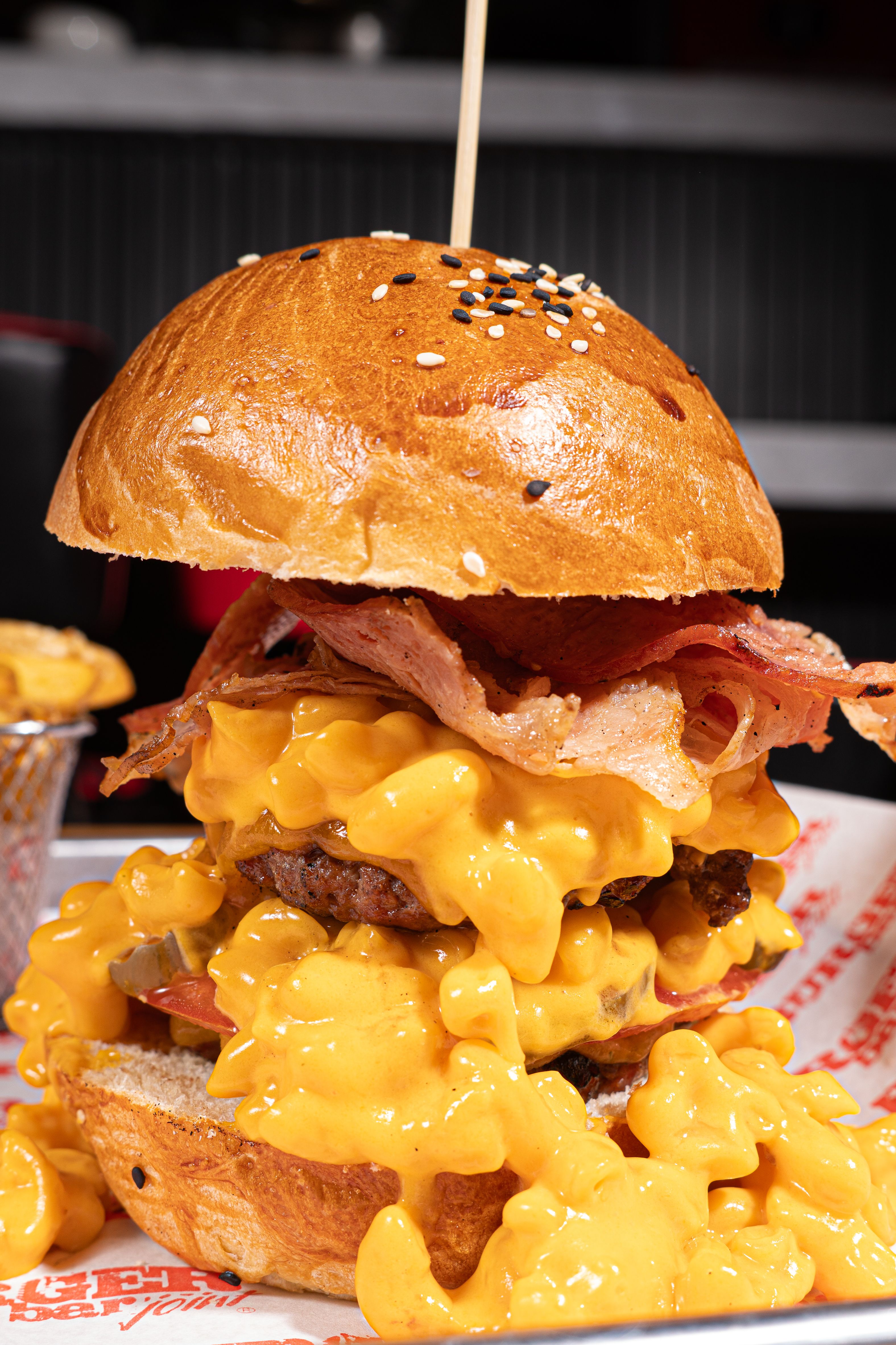 Loaded burger with bacon lettuce and fresh toppings