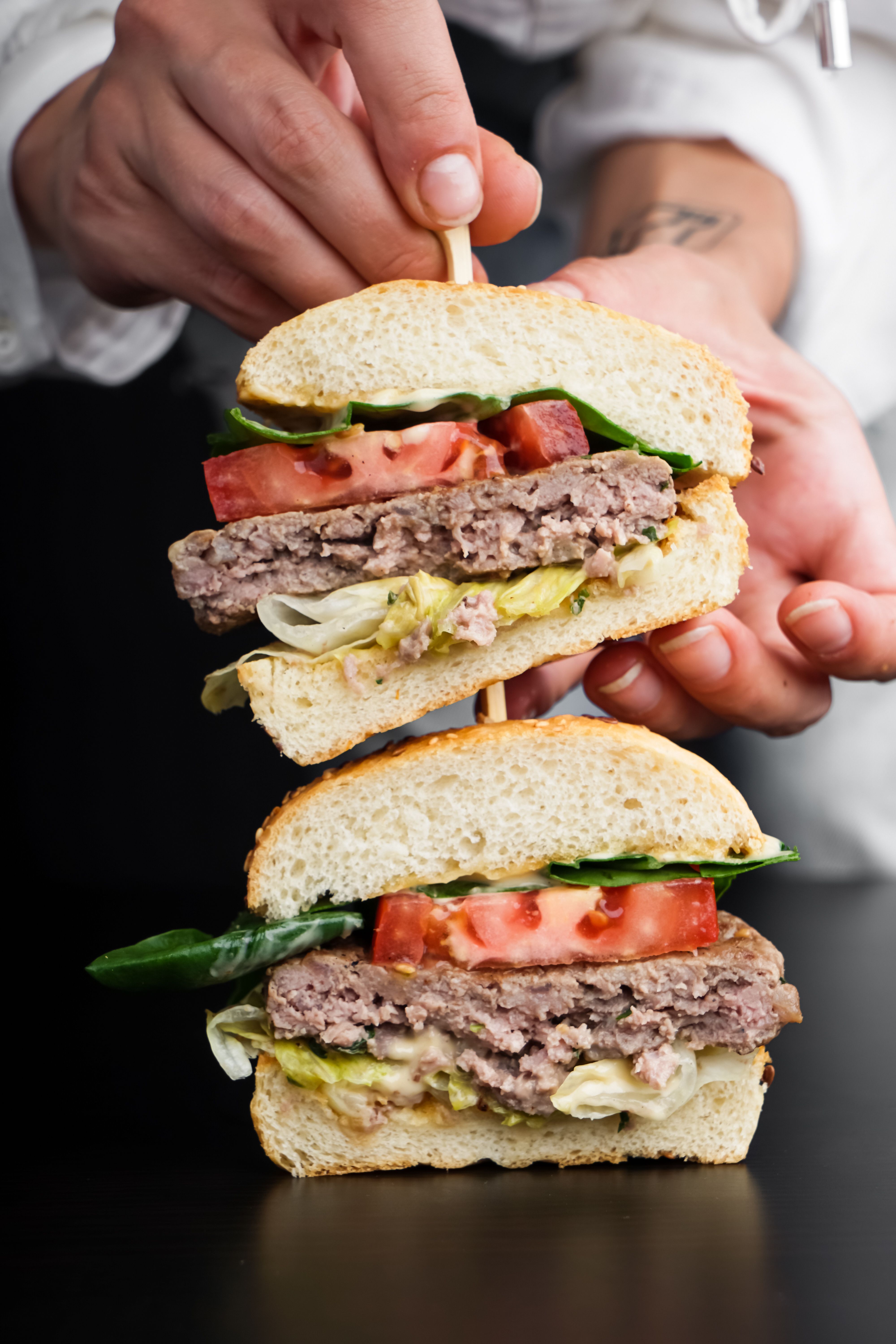 Loaded burger with sauce and melted cheese