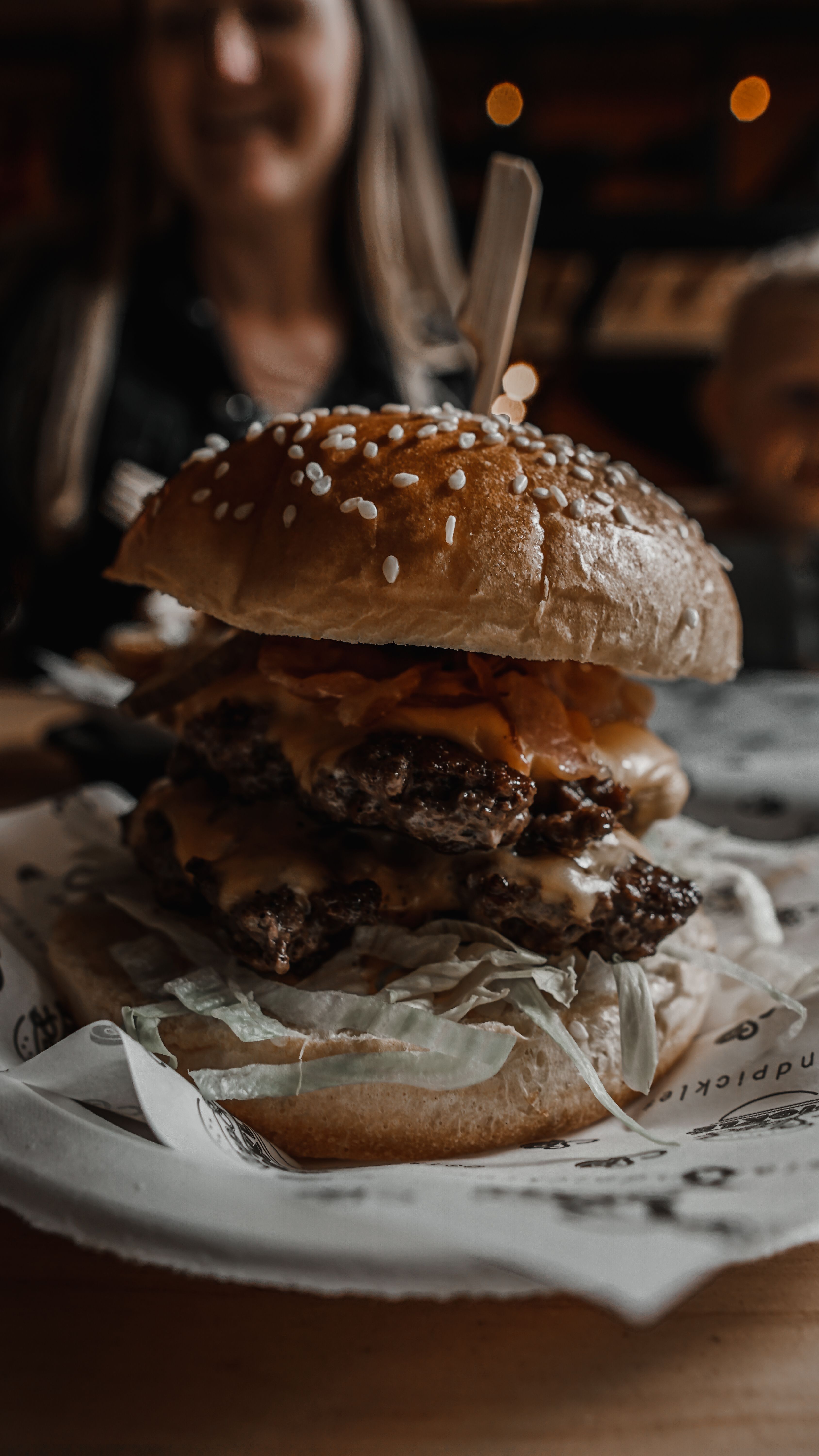 Loaded burger with bacon cheese pickles and fresh toppings
