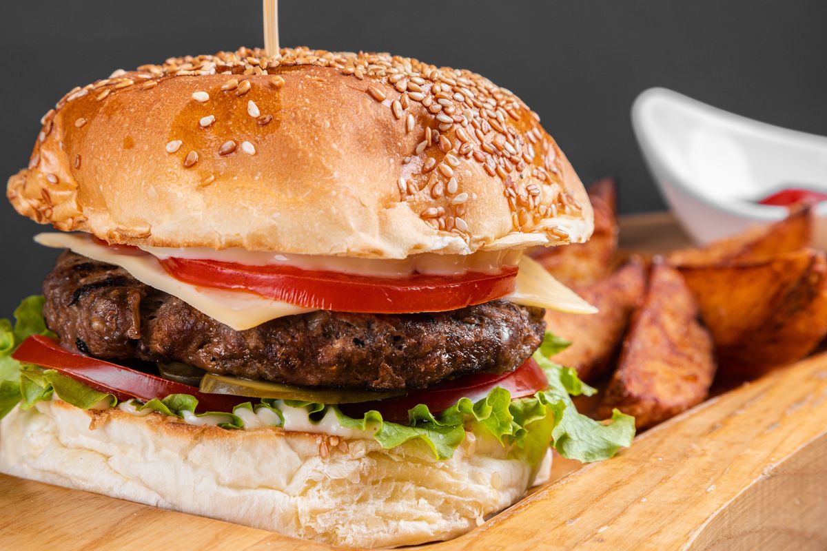 Spicy Burger with ketchup and melted cheese