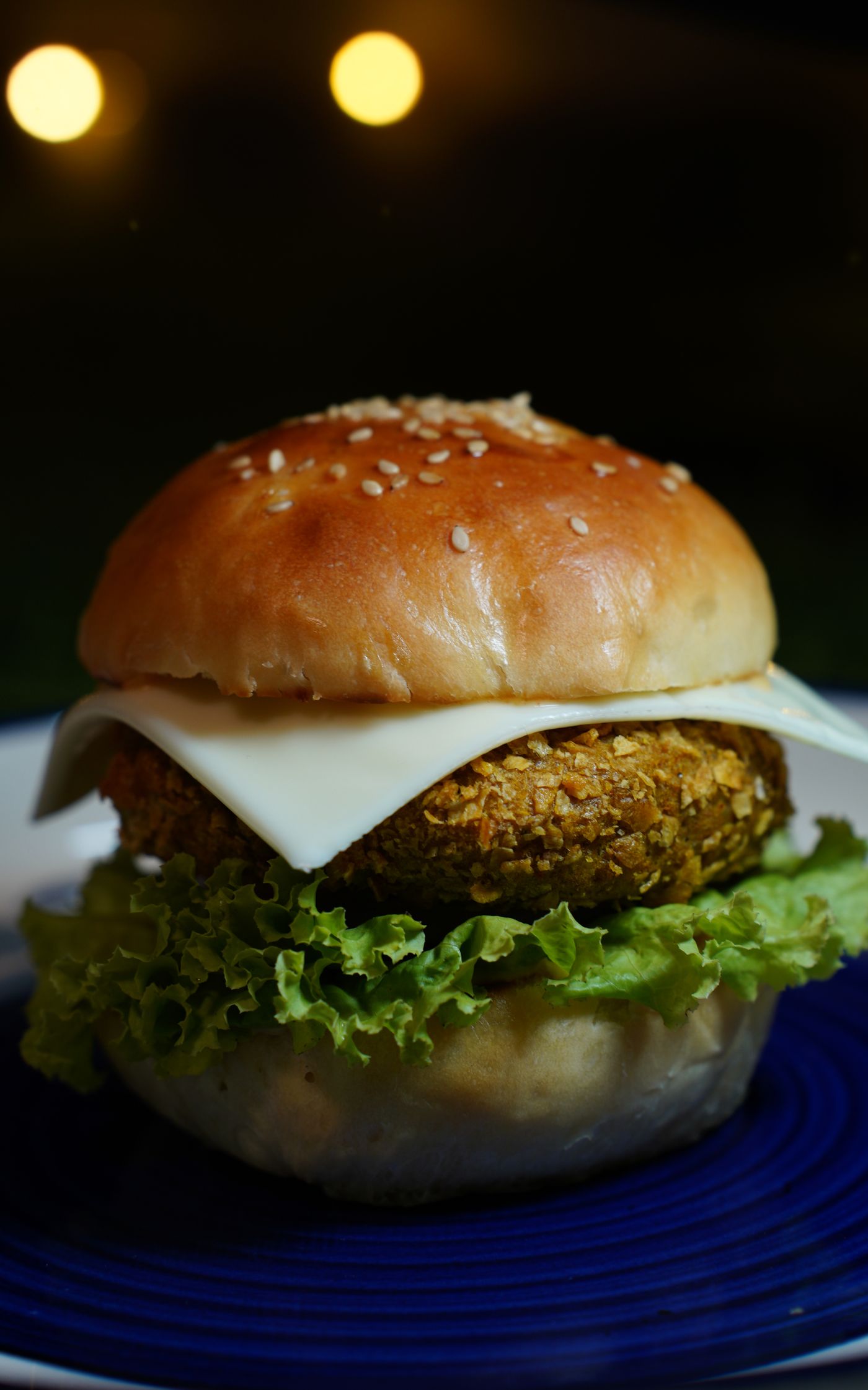 Veg Burger with melted cheese close up